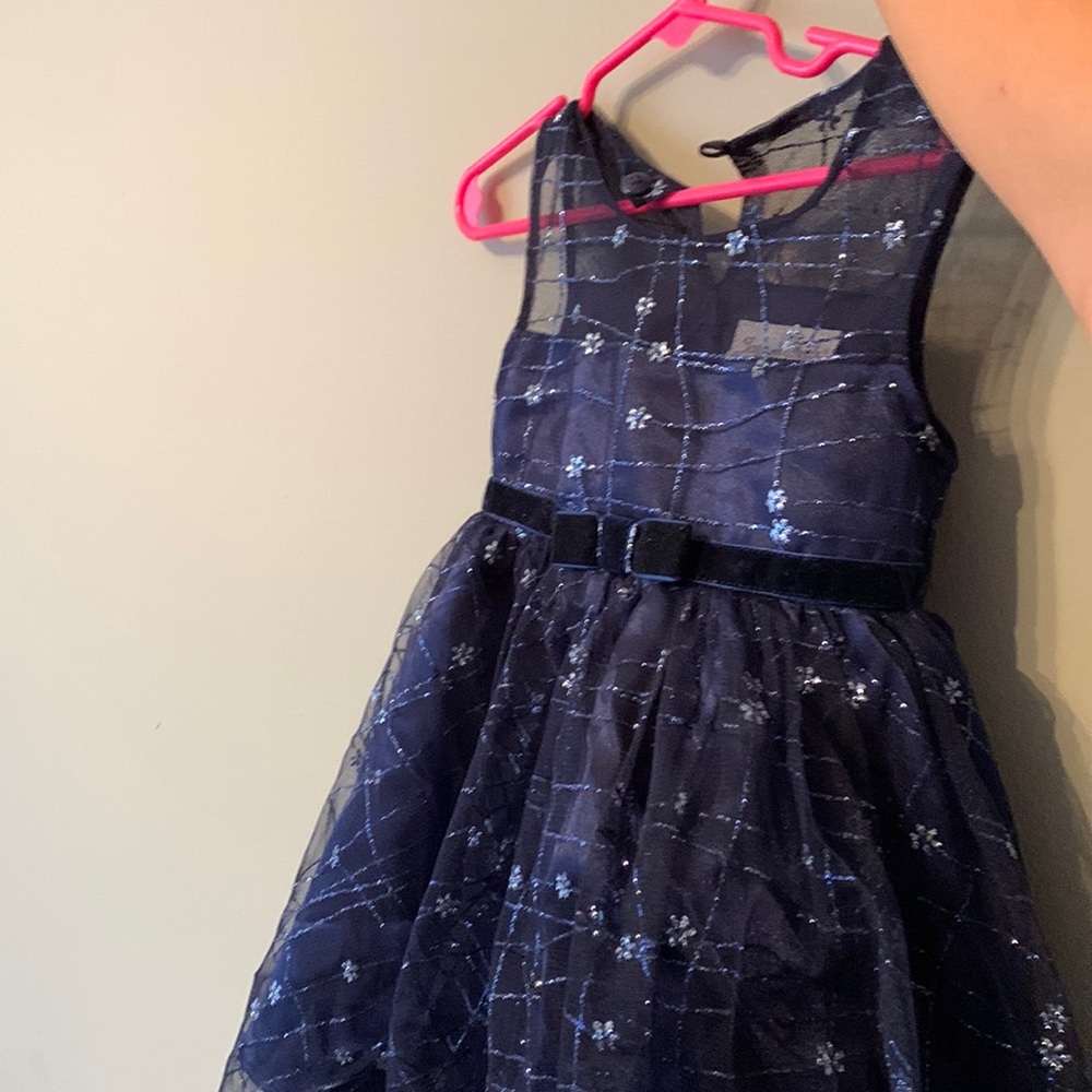 Toddler girl : Blue dress with sparkles and snowflakes , blue belt in the center
